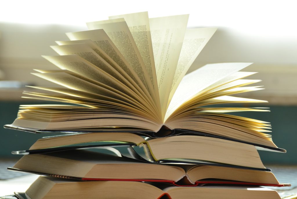 close-up shot of a big pile of books