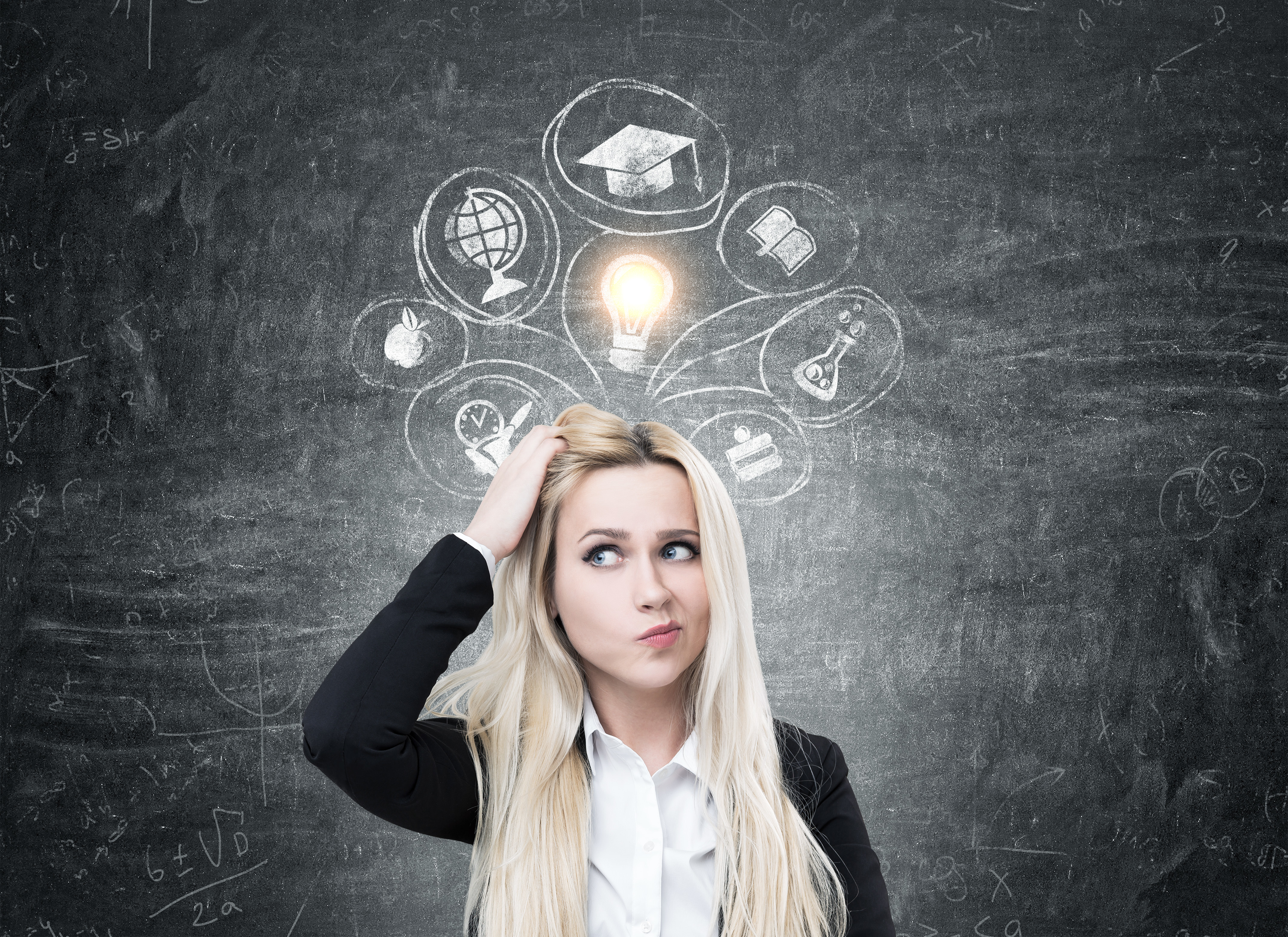 woman scratching her had with a lightbulb illustration above her head