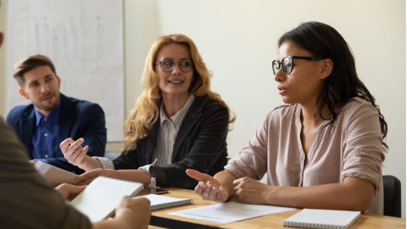 african american phd student consulting with professors