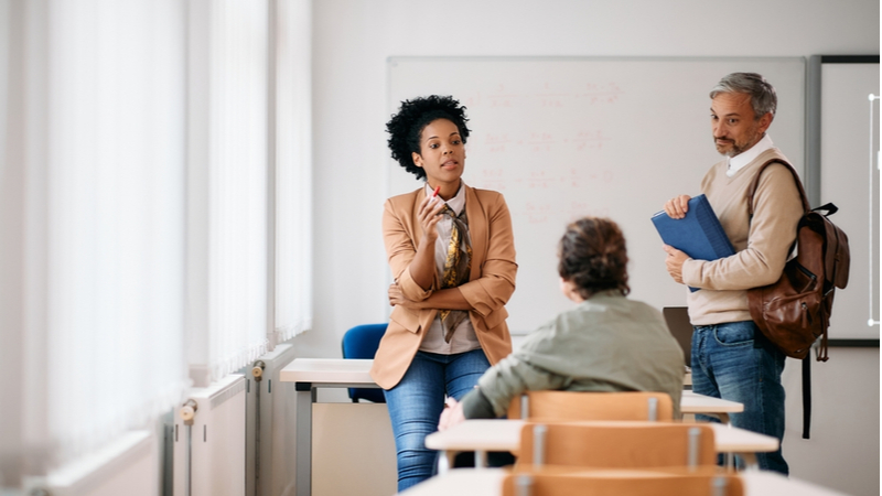 phd candidate consulting with professors