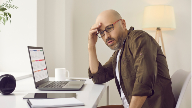 man worried about change in calendar