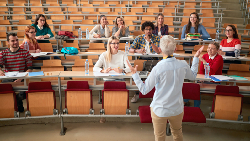 college professor teaching a small group of people