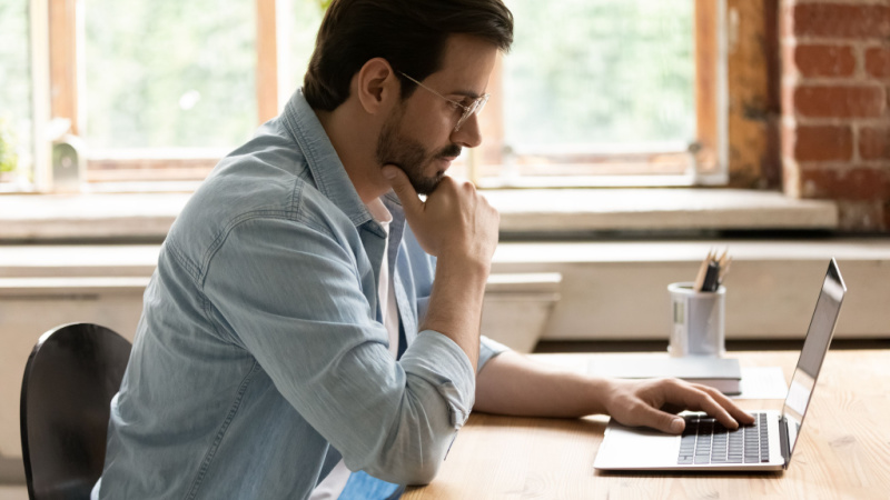 Caucasian grad student focused on statistical analysis